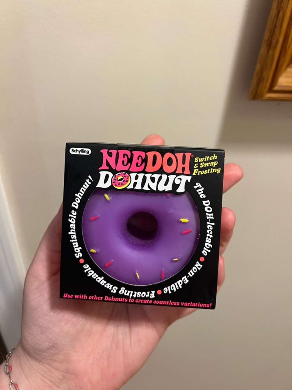 Needoh Donut Squishy Toy - Black Box with Pink/White Logo